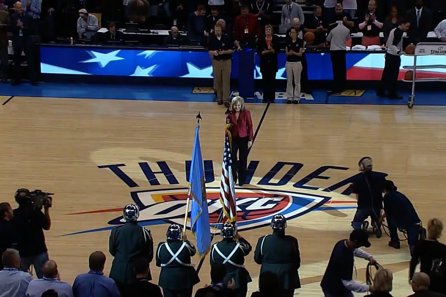 DeDe Murcer Moffett singing the National Anthem for the Oklahoma NBA City Thunser
